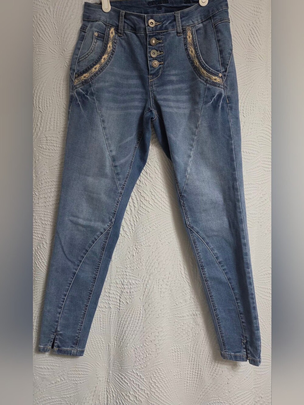 Women's  Low-rise Jeans in Light Blue Wash with Button Fly.